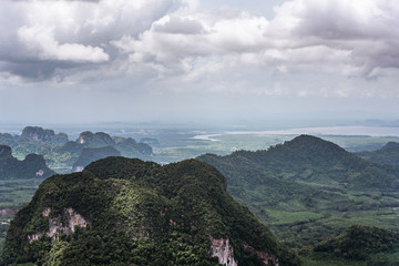 cloudy sky, and tropical jungle forest view from view point on a Natural landscape with the mountains