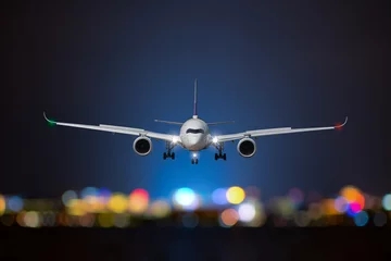 Fotobehang Airplane take off / landing at night © redkphotohobby