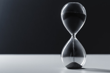 Hourglass on dark background