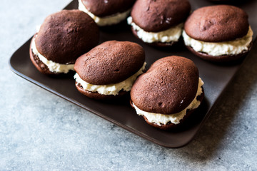 Homemade Chocolate Whoopie Pies Filled with Vanilla Butter Cream.