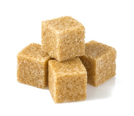 brown sugar cubes isolated on white