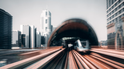 View from first railway carriage. Speed motion blur metro abstract background in the day