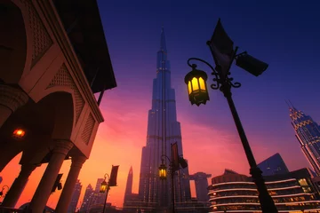 Rolgordijnen Beautiful view to Dubai city skyline downtown in the dusk, UAE © Ivan Kurmyshov