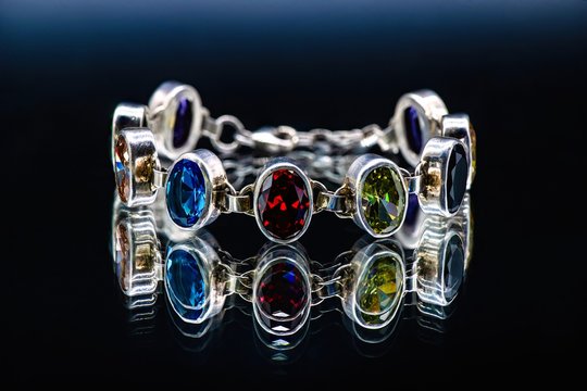 Silver bracelet with color jems Jewelry isolated 
