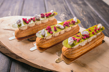 choux pastries with various fillings in a pastry shop