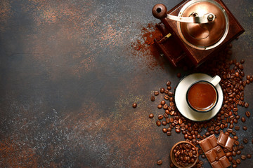 Cup of hot coffee with ingredients for making.Top view with copy space.