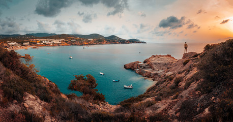 panoramic on the island of ibiza and its cliffs in an afternoon of contrasts and clouds - obrazy, fototapety, plakaty
