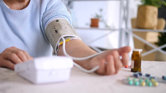 Senior Adult Measuring Blood Pressure