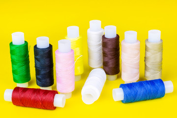 multi-colored coils with threads