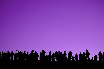 Group People Silhouette on purple background with space can used for design.