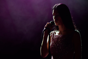 close up image of live singer on stage