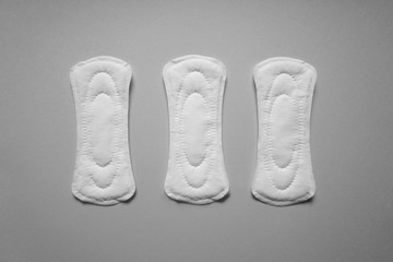 Menstrual pads on grey background