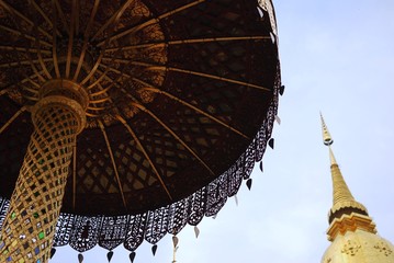 Golden pagoda at Wat Phra That Hariphuncha, the public temple in Northern Thailand.