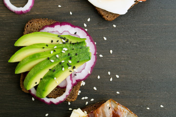 bread with avocado, olive oil and sesame seeds