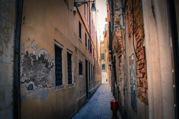 Beautiful narrow street in Venice Italy