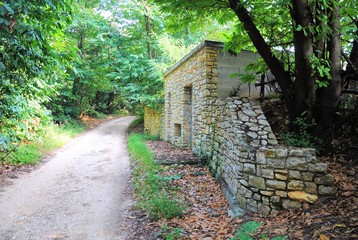 Stone construction for a power plant in a natural environment.