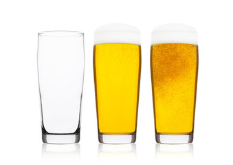 Cold glasses of lager ale beer with foam