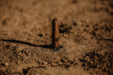 Cigar on sand