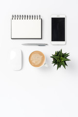 Modern office desktop with white smaprt phone and copy space