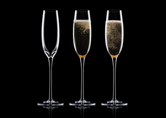 Elegant glasses of yellow champagne with bubbles