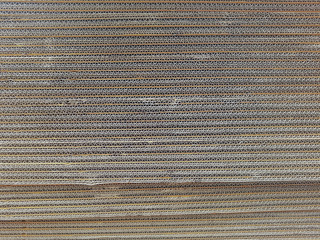 Brown packaging boxes stacked with overlapping background.