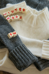 Top view of two woolen sweaters with 