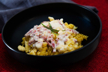 Pasta Torti with Carbonara and smoked bacon