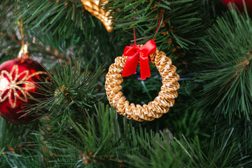 Decorations in the Scandinavian style on an artificial Christmas tree