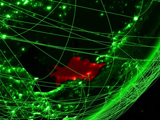 Turkmenistan on green model of planet Earth with network at night. Concept of green technology, communication and travel.