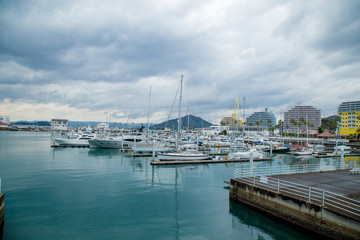 Yacht club after rain with mirror water reflect at Wakayama marina city, Kansai, Japan