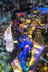 Namba parks top view, Osaka, Japan with City skyline overlooking Namba District with winter night illumination show around Osaka city