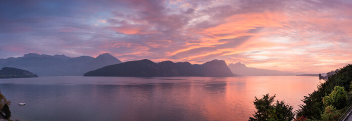 Panoramic view Sunset over the mountains and lake. Switzerland. Weggis