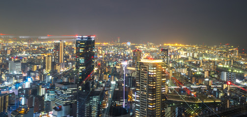 Cityscape view from Kuchu-Teien Observatory in Umeda Sky Building that can see 360 degree of Osaka City, Japan