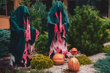 Dummy monks Halloween decoration with the pumpkins