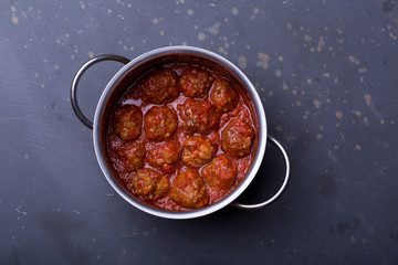 close up of meatballs and tomato sauce