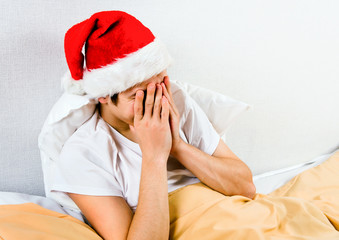 Sad Young Man in Santa Hat