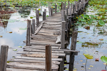 Old wooden bridge across the river.