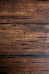 Brown scratched wooden cutting board. Wood texture. Wood background. 