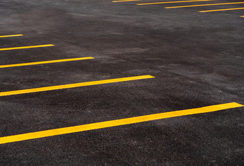 Parking lot for motorcycle and bicycle with yellow line background. asphalt road © bjginny