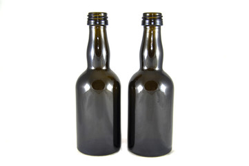 Wine bottles on white background close-up