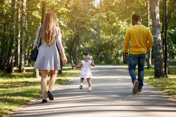 African American father and a white mother with a daughter.