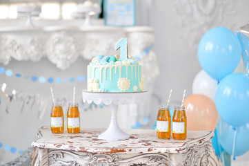 One year birthday decorations. Decorations for holiday party. A lot of balloons blue and white colors. 