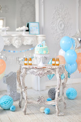 One year birthday decorations. Decorations for holiday party. A lot of balloons blue and white colors. 