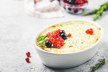 Cottage cheese poppy seed and berries bake. Selective focus, space for text.