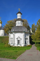 Fototapeta na wymiar Chapel Pyatnitsky well - a holy spring near the walls of the Troitsko-Sergius Lavra was built in 1725. Russia, Sergiev Posad, September 2018.