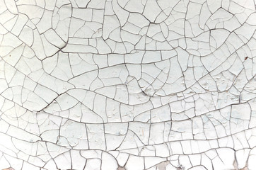 Background of broken cracked white paint 