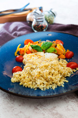 Andalusian fish, saffron rice with vegetables