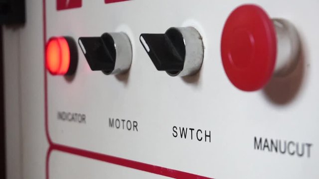 Close-up of white plant equipment control switch panel. Modern automated industrial plant enterprise control panel. . Footage. Concept of automatic machine operation of production
