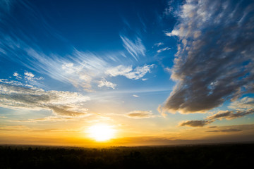 colorful dramatic sky with cloud at sunset.