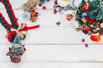 Christmas background with decorations and gift boxes on wooden